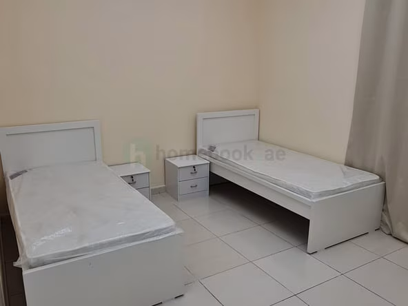 Bed Space & Partition for Rent in Sharjah